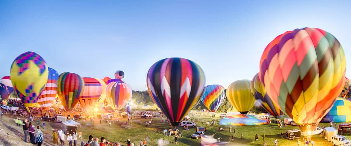 Bright Hot Air Balloons Glowing at Night
