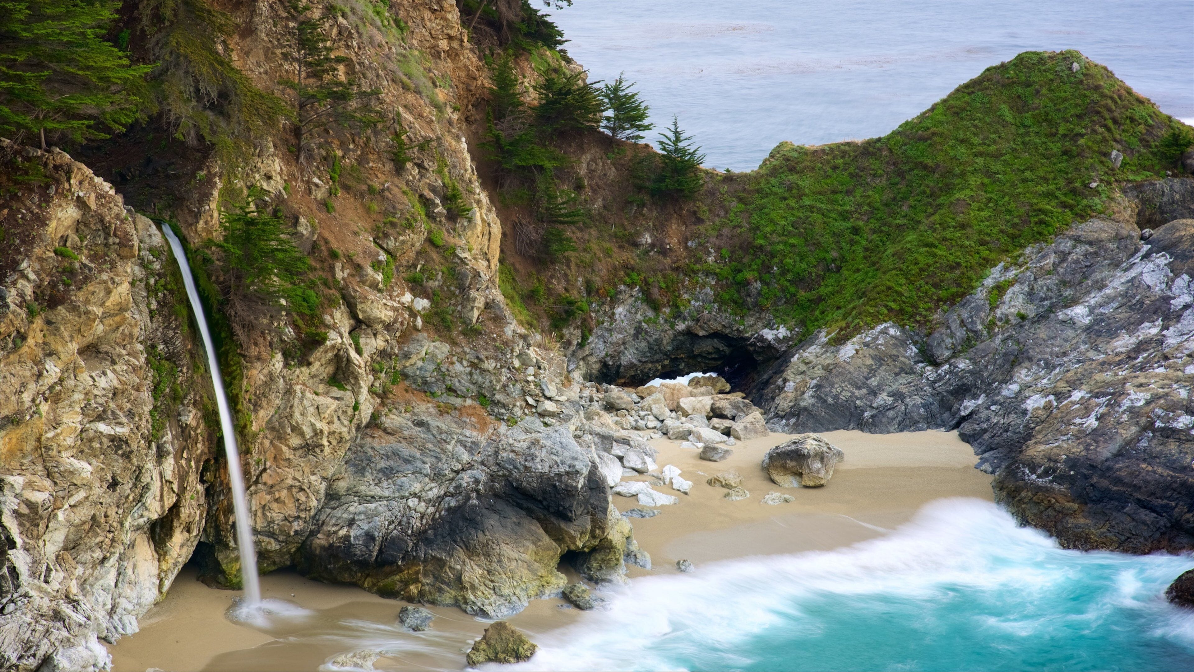 Big Sur showing rugged coastline, a sandy beach and general coastal views