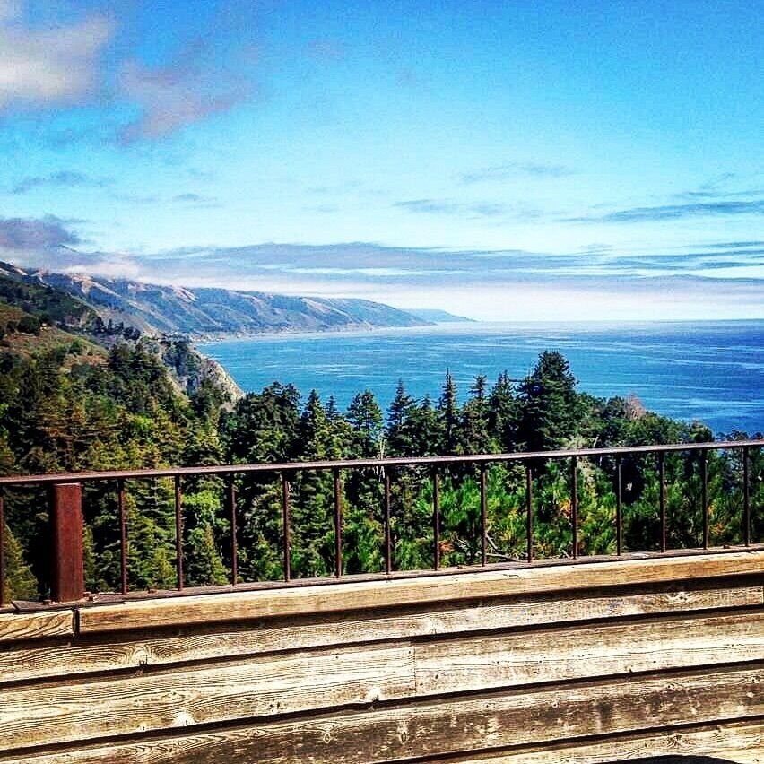 Along the Pacific Coast Highway (PCH), just outside Carmel, California Is a little place called Nepenthe.  Make this one of your stops. You can grab a snack and /or a really good cappuccino.  Then sit and enjoy your view above the treetops out into the beautiful Pacific Ocean.  Don't be surprised if you see otters, sea lions, dolphins, and whales.  You'll probably loose track of time here.  So don't be in a hurry. Prepare to be mesmerized. 
#BeachBound