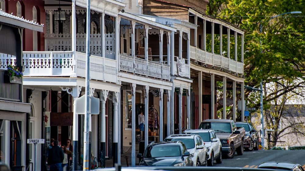 Historic Gold Rush era Main Street with balconied buildings in Sutter Creek, California