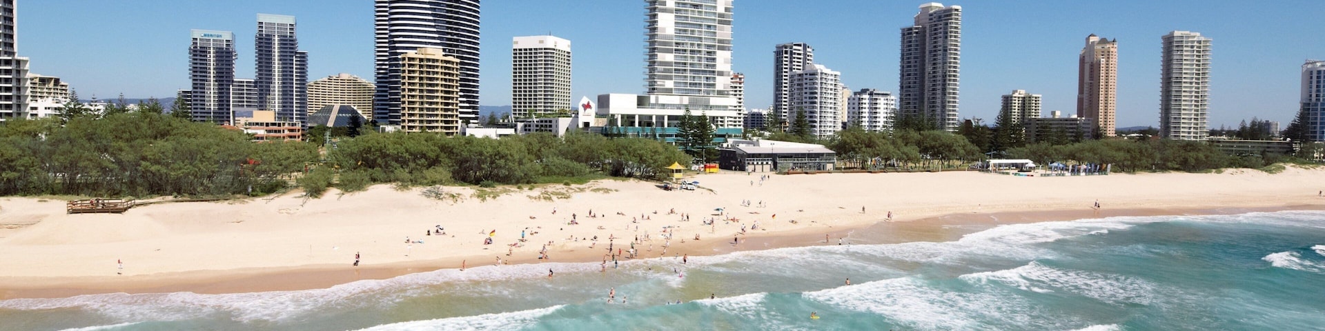 Broadbeach featuring a high rise building, skyline and a beach