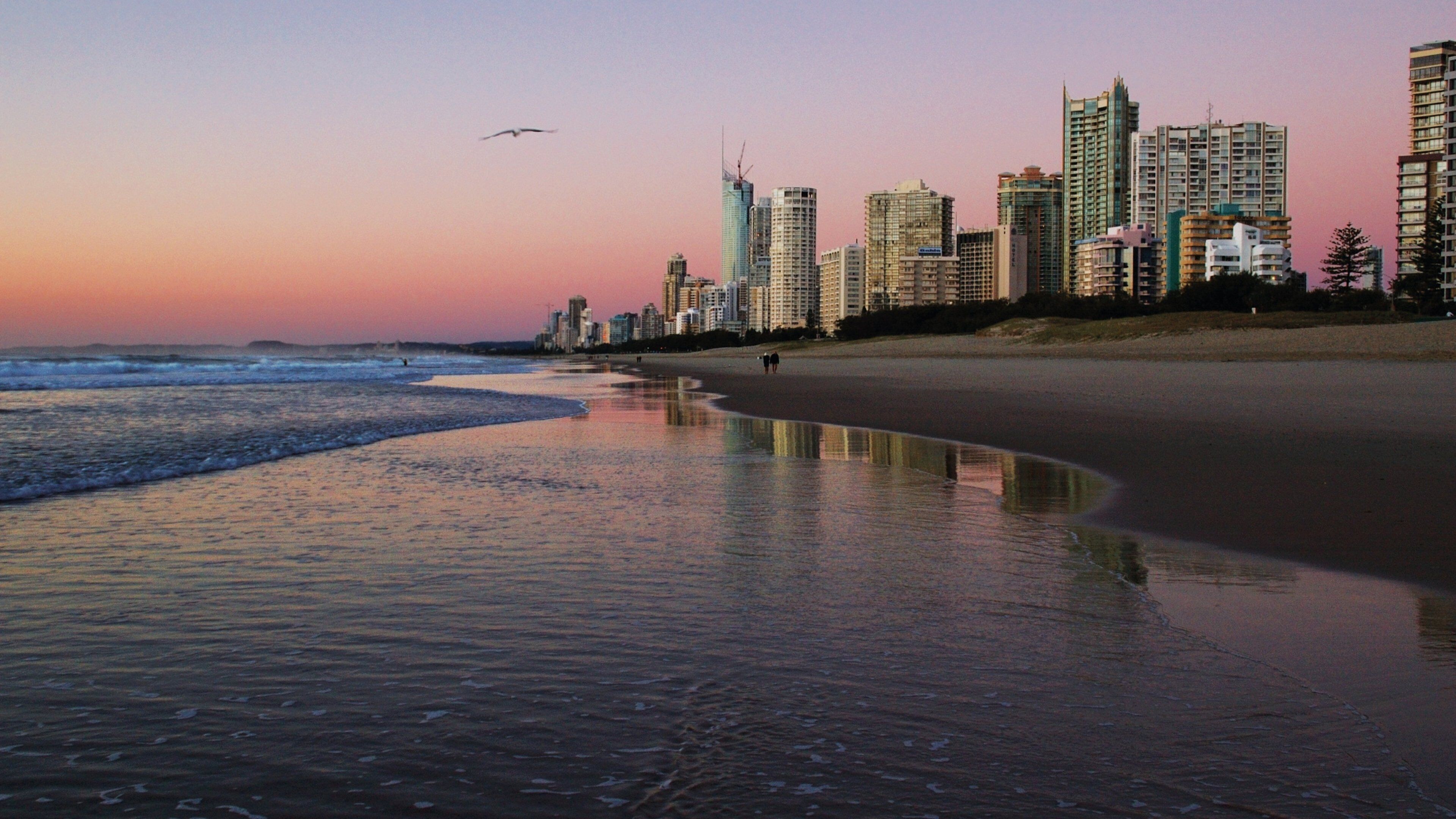 Broadbeach showing a high rise building, general coastal views and a coastal town