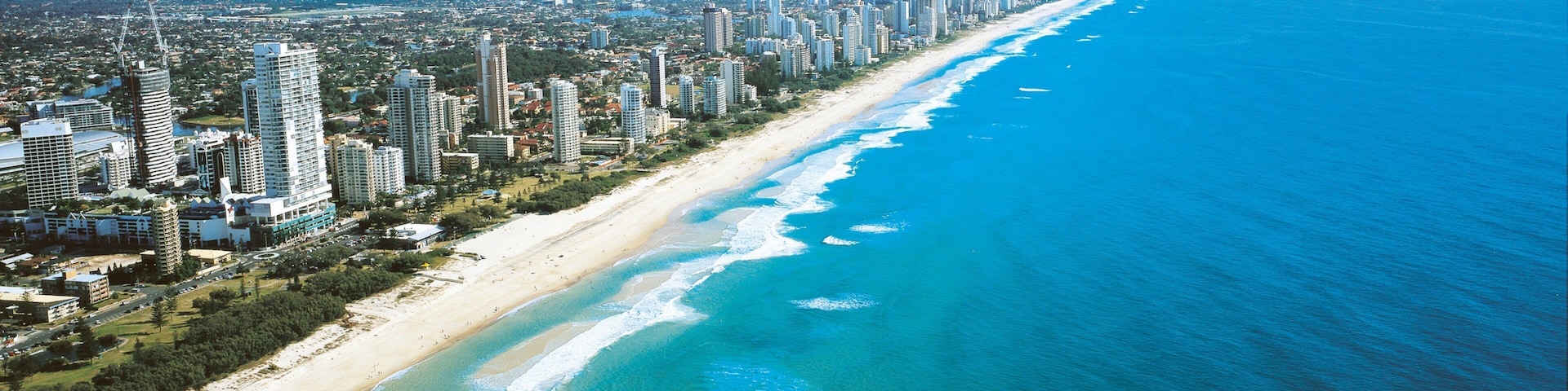 Broadbeach showing a beach, cbd and a city