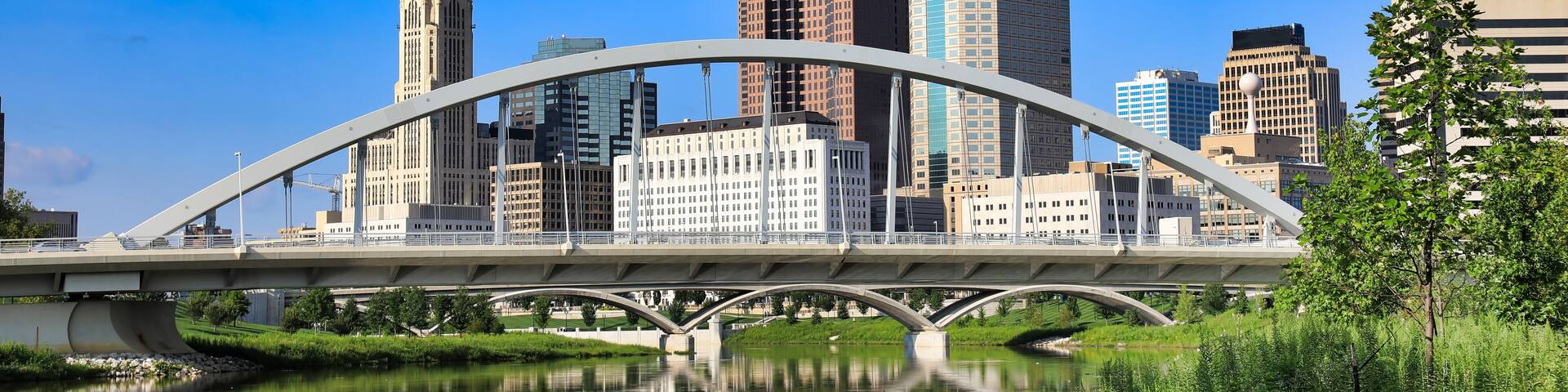 The Main Street Bridge spans the Scioto River in Columbus, Ohio and is a major landmark in the downtown district of the USA city.