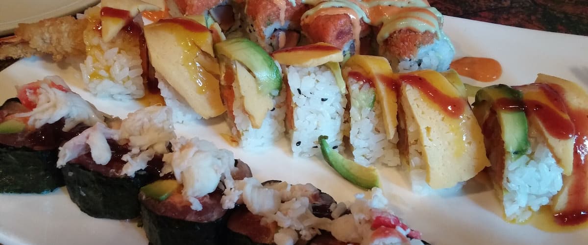 A selection of specialty rolls from Royal Ginger. The winner would have to be the Great Harvest roll with fried sweet potato, cream cheese, tempura shrimp with avocado, sweet egg, and mango pulp.