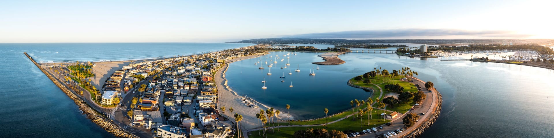 Aerial view of beautiful Mission Bay with boats and marina under a sunny sky, San Diego, USA.