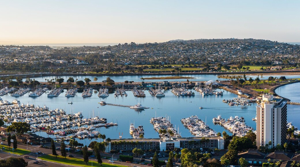 Aerial view of picturesque Mission Bay with boats and marina under a blue sky, San Diego, USA.