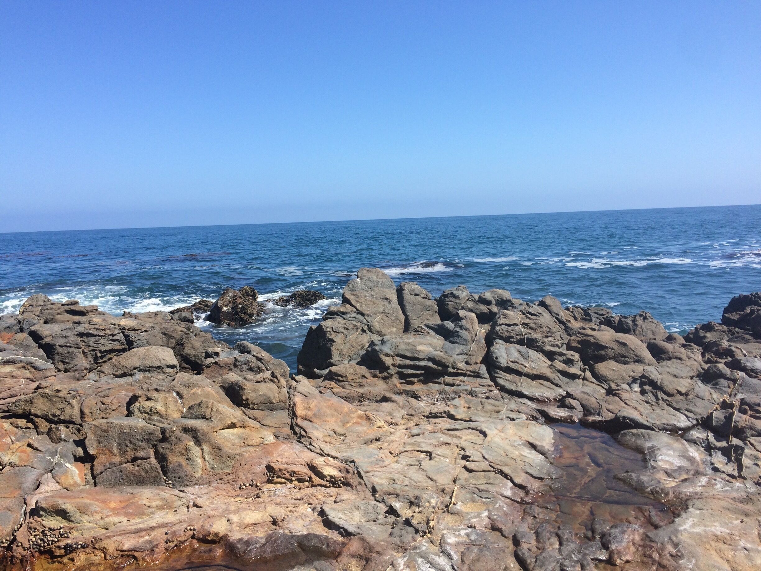 Hiked along the beach to get to the channels to jump off the rocks. Went with an infant walked the upper trails (lots of steeper parts and walked along the road part of the time). If the surf is harsh then it's dangerous to jump, but high tide was nice today.