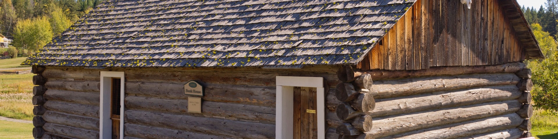 Historic log bunk house at 108 Mile Ranch in BC, Canada
