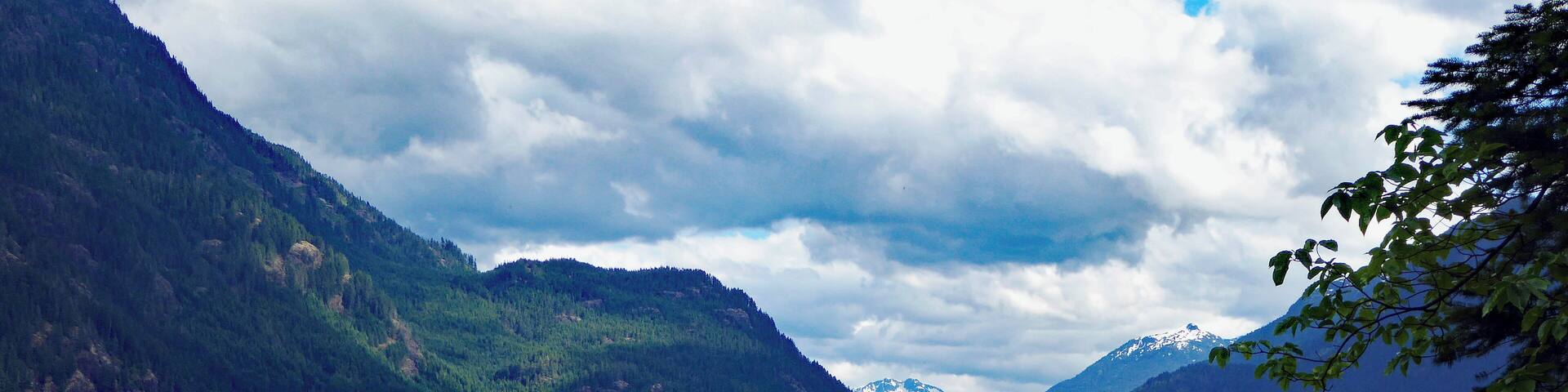 Buttle Lake is beautifully situated in the wilderness of Strathcona Provincial Park in the centre of Vancouver Island. When the water is low tree stumps of some areas of deforestation are uncovered.
Whilst it is remote it is served by good roads which are required for logging transport. These roads are, mercifully, however very quiet.
The campground is basic, pumped water & pit toilets, which in reality take it one stage from wild camping but that is as it should be in a remote area of natural beauty.
Do not bother with your mobile phone here. Not a cat in hell's chance of a signal!! Great! #GreatOutdoors
