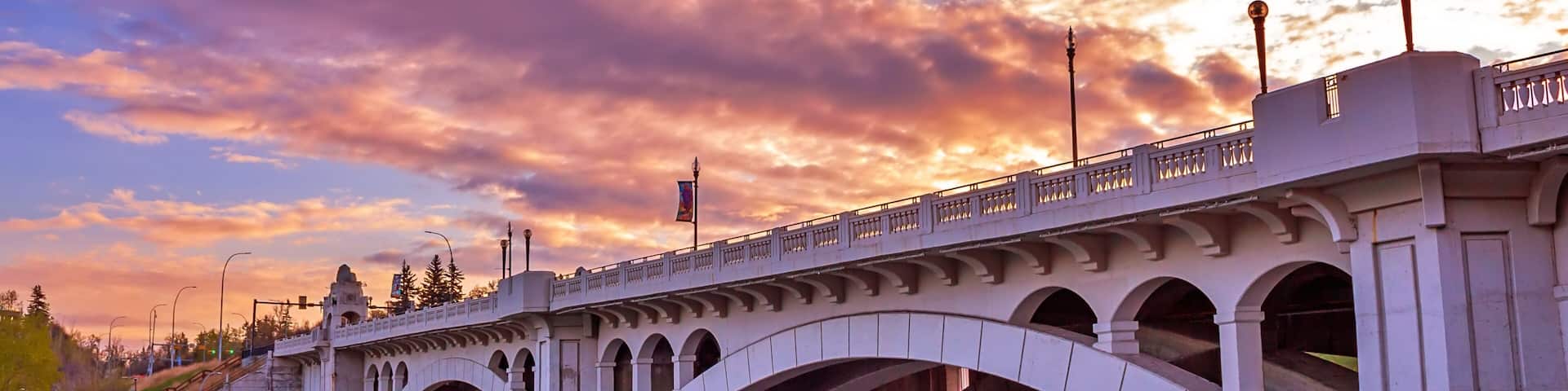 Vibrant Sky Over The Bow River Bridge