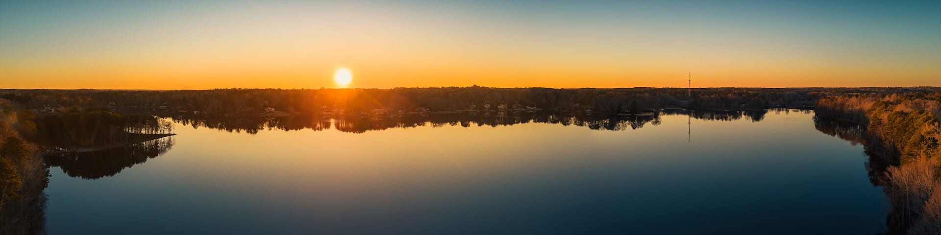 Beautiful aerial view of a lake at sunset, nature. ozark lakes, peachtree city.