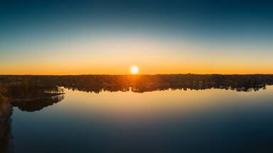 Beautiful aerial view of a lake at sunset, nature. ozark lakes, peachtree city.