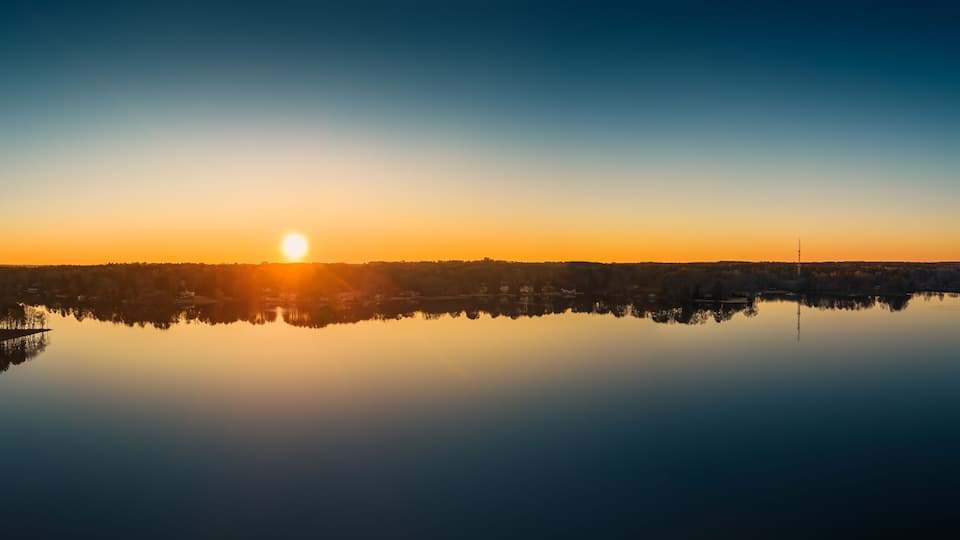 Beautiful aerial view of a lake at sunset, nature. ozark lakes, peachtree city.