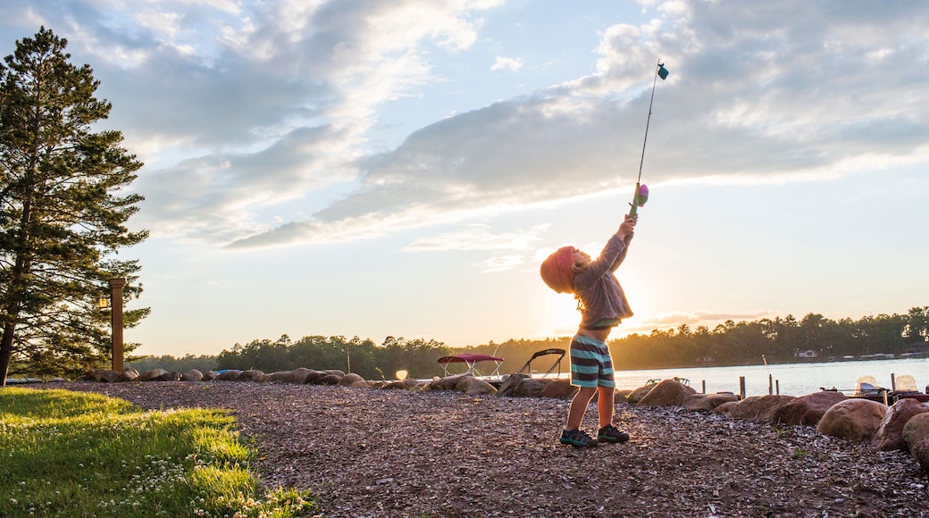 Caucasian girl holding fishing pole