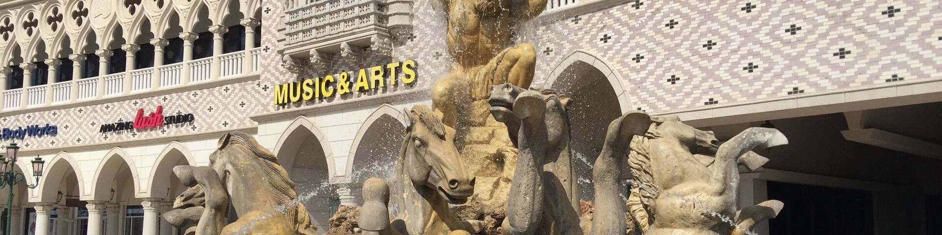 Strip center with a Buffalo Wild Wings and others.