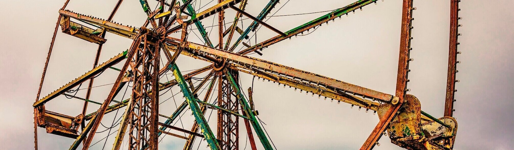 Every time I pass by this place I say I need to stop. The last time I did the gate was closed and locked, so I couldn't get inside, but this time the gate was open.
You can see it from the expressway. It used to be a gas station and fireworks store, but now it is just an empty lot with a couple old ferris wheels and other carnival equipment. It is very eerie and beautiful though, if you see it I'd stop and walk around a minute.