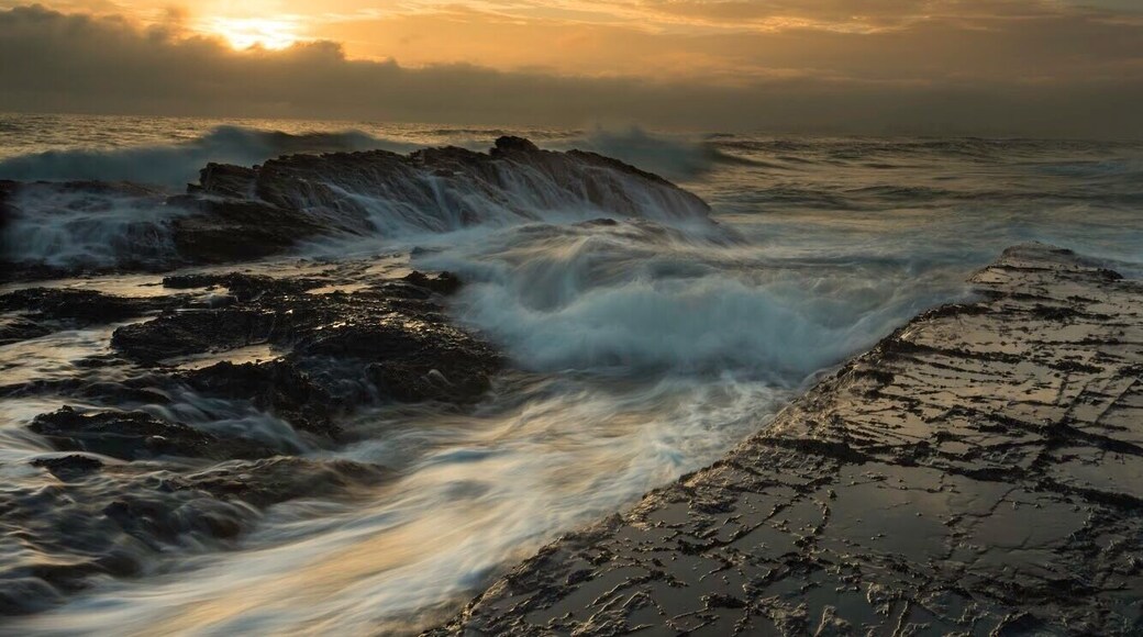 An amazing place for photography, very interesting rock formations with the waves coming from all directions so easy to get the capture needed, best at sunrise. The only down side is fighting the surfers who will stand in front of you when you are set up taking your shots as well as the other photographers that flock there