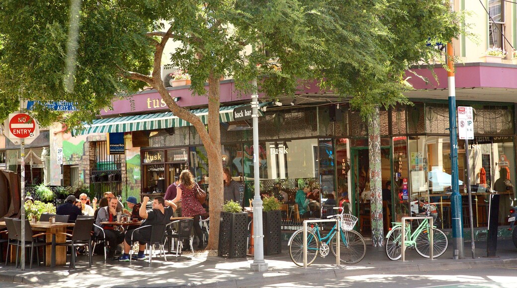 Prahran showing street scenes and outdoor eating as well as a small group of people