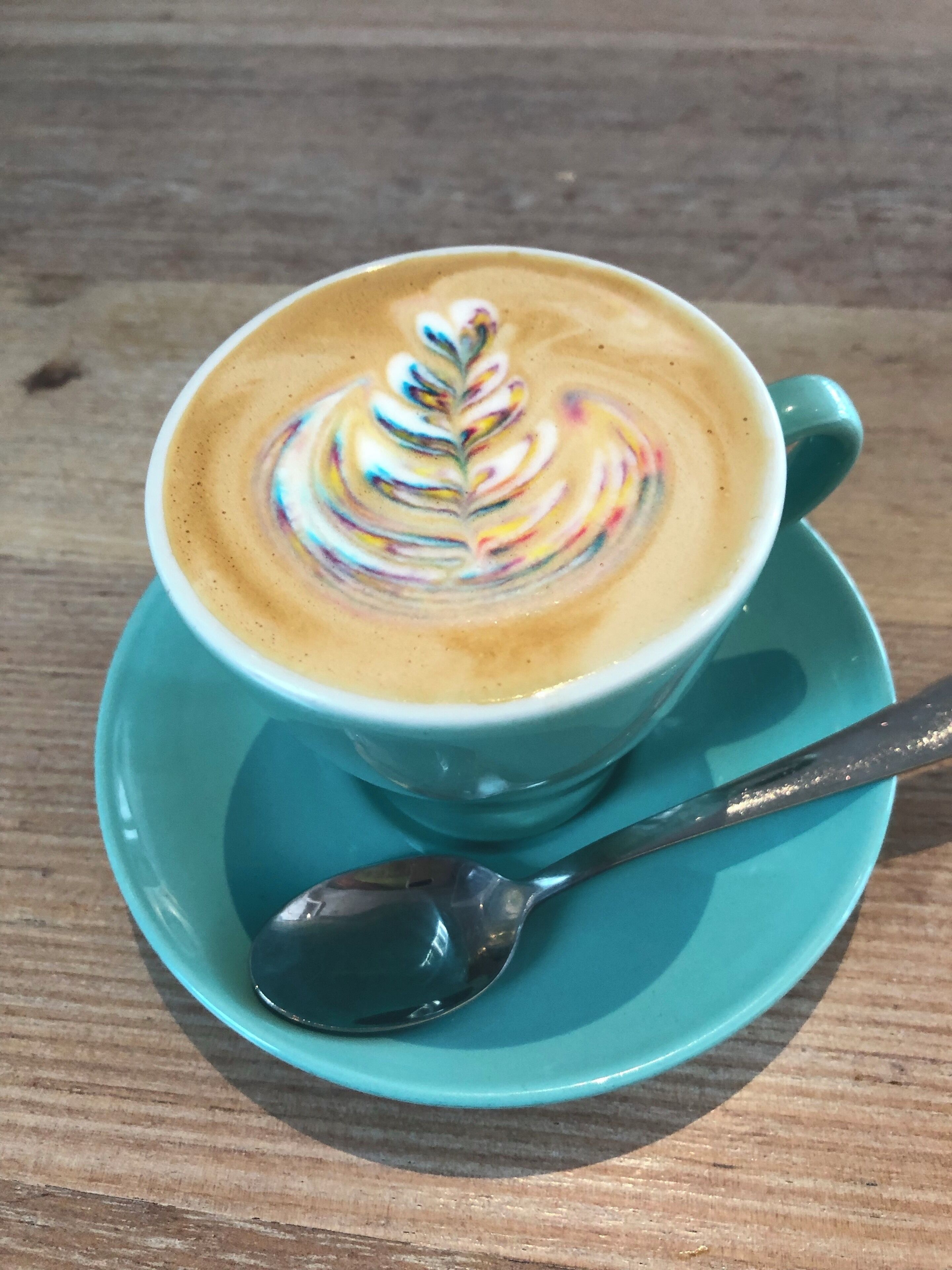 A beautiful rainbow latte - latte art