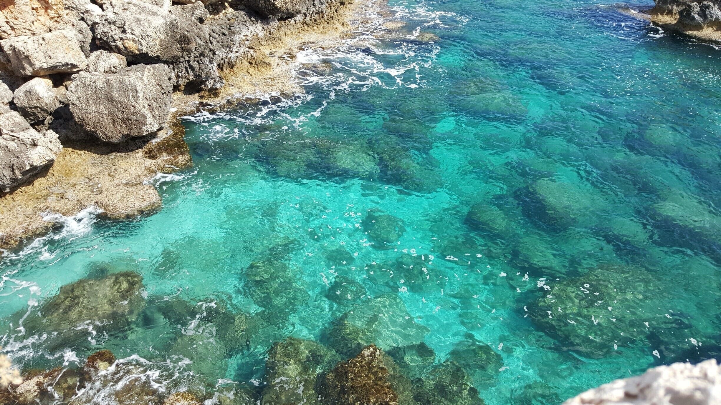 was hanging over the cliff to get this photo.  My husband was holding my feet, but I surely got it.  He was so nervous, ha ha