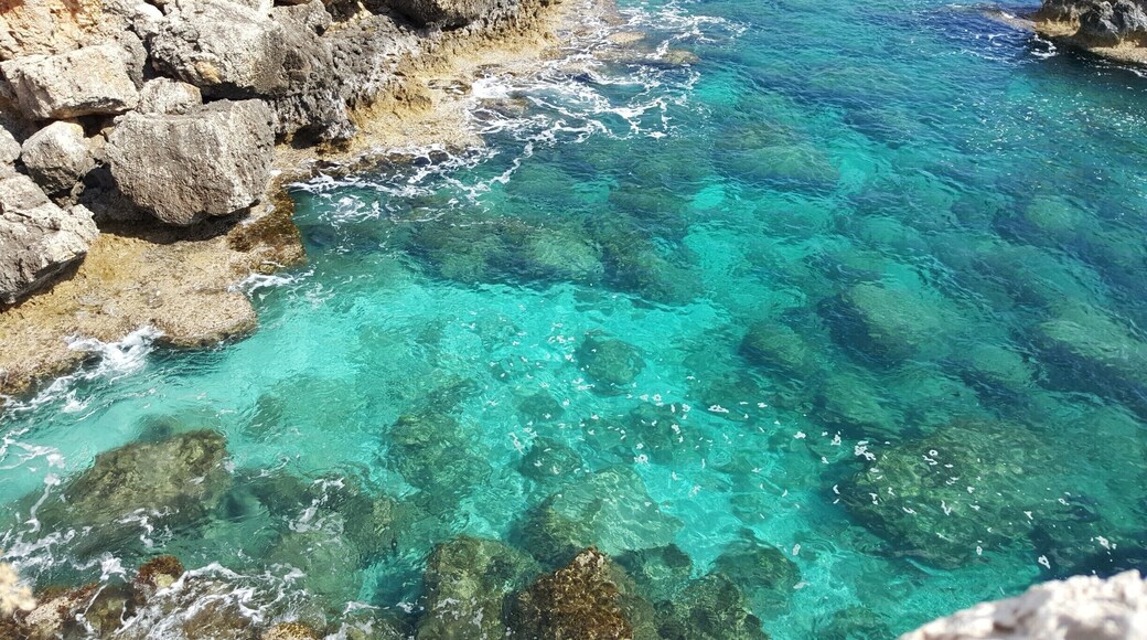 was hanging over the cliff to get this photo. My husband was holding my feet, but I surely got it. He was so nervous, ha ha