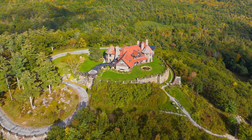 Castle in the Clouds aka Lucknow mansion aerial view in fall at the top of Lee Mountain with Lake Winnipesaukee and Ossipee Mountains at the background in town of Moultonborough, New Hampshire NH, USA