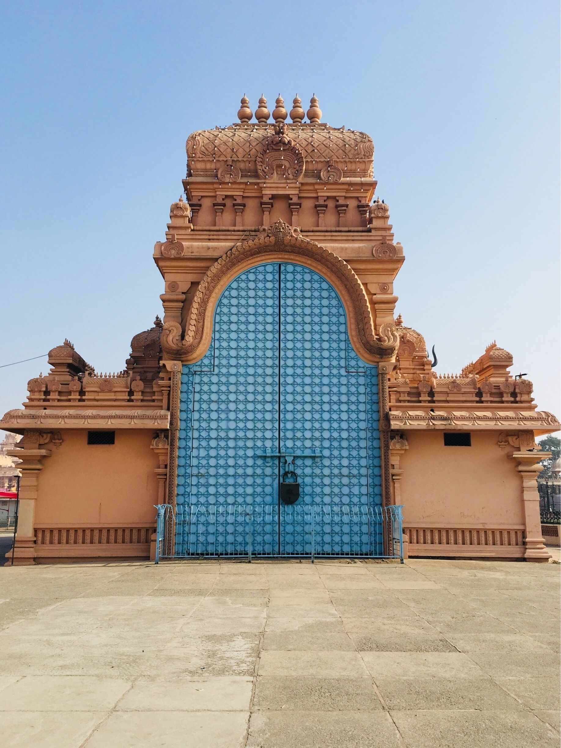 Huge Gate with big Lock...  It’s a religious place. 
