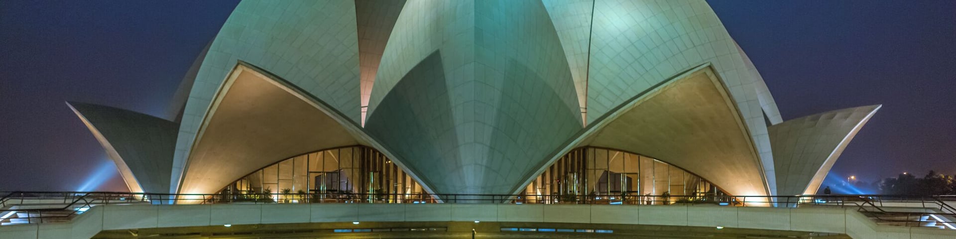 This architectural marvel entered the Guinness Book Of World Records in 2001 as the religious place attracting the largest number of visitors. Lotus is a symbol of oneness and purity and Baha'i faith believes in that - hence the shape. The building essentially is stacking of 3 layers of 9 petals. Besides other awards, Glob Art Academy, Vienna called it the Taj Mahal of 20th Century.
#StunningStructures #OurPlanetsLandmarks #travelure #BahaiTemple #LotusTemple #NewDelhi #India #GlobArtAcademy #GuinnessBookOfWorldRecords
For more #travel stories, visit http://www.travelure.in or http://www.travelphotography.net.in
