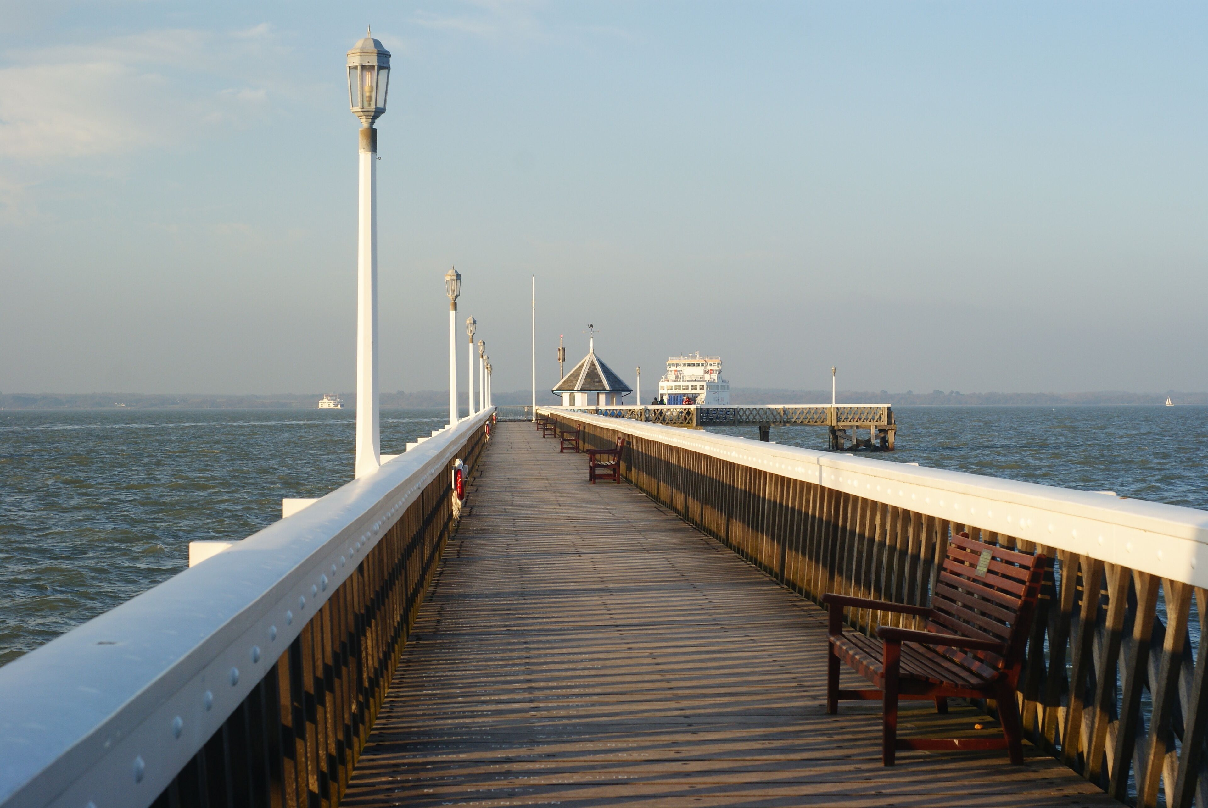 Yarmouth Pier Looking along Yarmouth Pier. Two Isle of Wight ferries can be seen, going and coming. http://www.theheritagetrail.co.uk/piers/yarmouth%20pier.htm