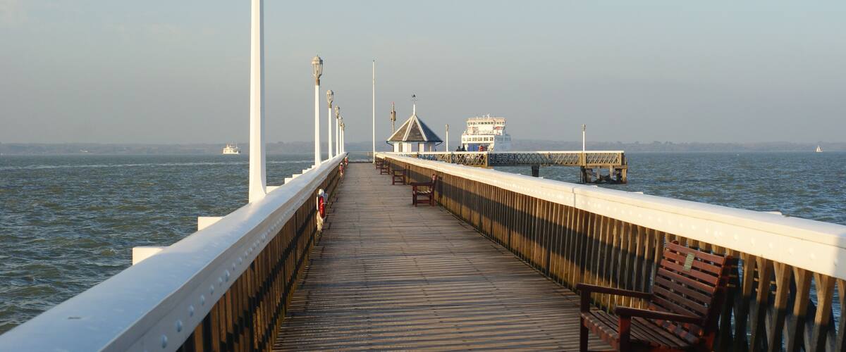 Yarmouth Pier Looking along Yarmouth Pier. Two Isle of Wight ferries can be seen, going and coming. http://www.theheritagetrail.co.uk/piers/yarmouth%20pier.htm