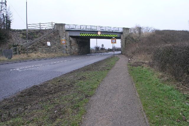 Railway Bridge. This bridge carries the Robin Hood Line over the A616 at Creswell. Despite the high visibility stripe and an early warning device over the road on the approach to the bridge it is still hit by high vehicles occasionally. A number of years ago four people were killed here in such circumstances.