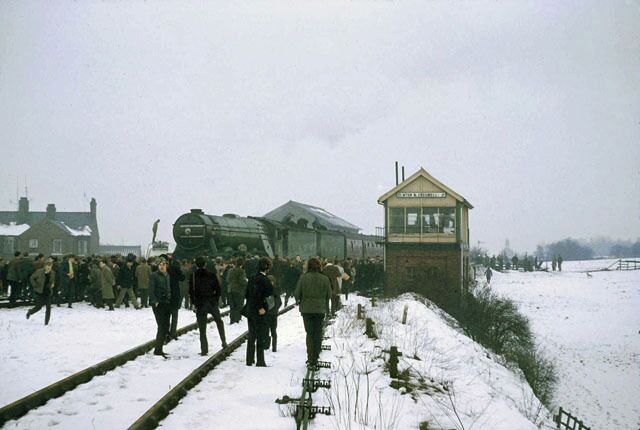 Mystery tour at Elmton & Creswell Junction, 1969 The "Flying Scotsman" pauses for water and the passengers take a look around. Unlikely to happen these days. The mystery train started from St Pancras and ended up at Cleethorpes considerably late, where the locomotive was declared a failure with a leaking steam pipe in the smokebox.