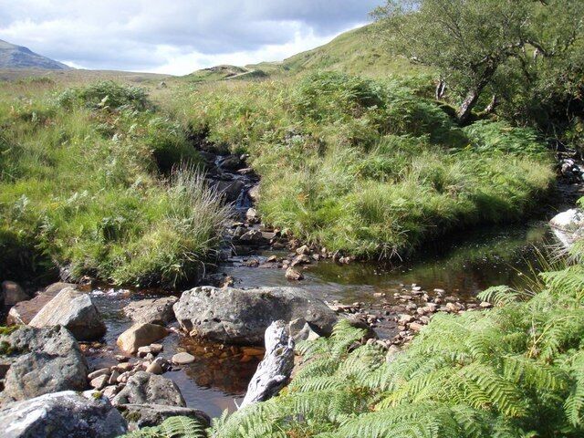Merge of two burns Allt na Chnoic Glais being beefed up just before joining the Cassley
