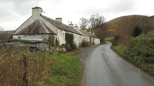 Cottages, West Bold Row of cottages on the minor road south of the Tweed, opposite Walkerburn.