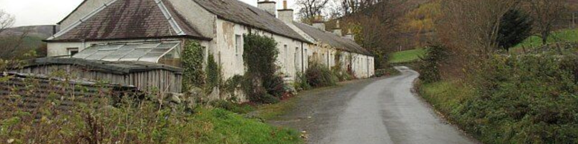 Cottages, West Bold Row of cottages on the minor road south of the Tweed, opposite Walkerburn.