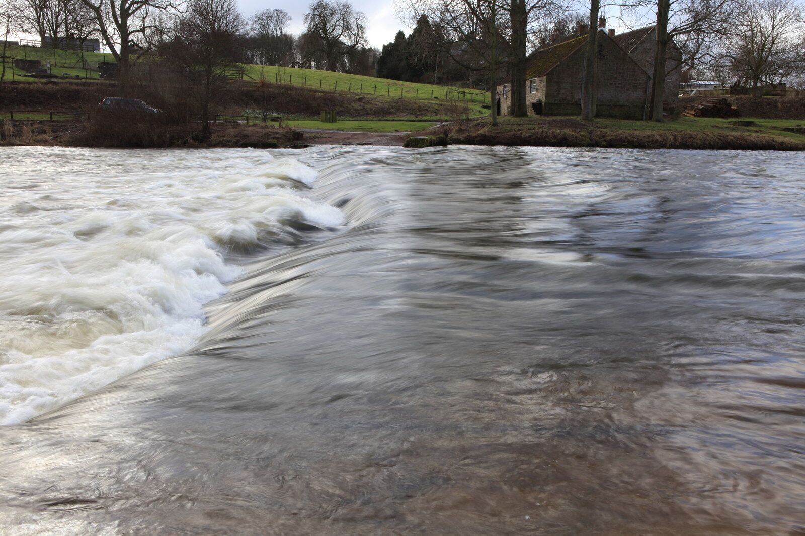 The Ford at Etal. No crossing here today after heavy rain and snowmelt. Quite a change from this photo 767852