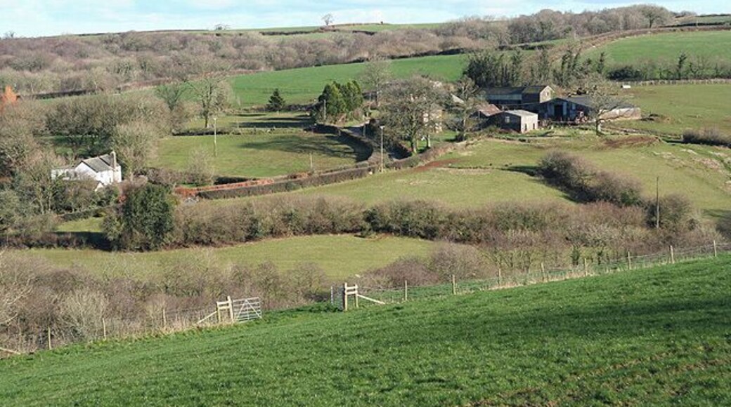 Meshaw: towards Parsonage Farm Parsonage Farm is centre right in this view, with Prescott on the left, by the lane from Meshaw to East Whitestone. Looking east-north-east by the A373 road
