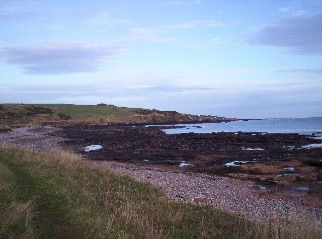 Beach near Johnshaven. Near the bushes on the left is the Narrows lime kiln
