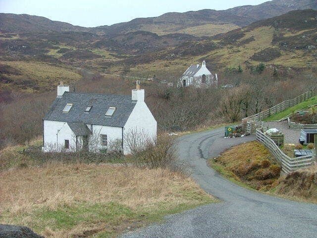 End Of The Road. The end of the Aird township road. The former Church behind the house is now a Gallery.