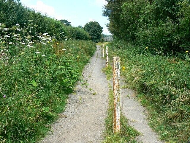 Bridleway, near Faringdon golf course This short stretch was once the minor road to Great Coxwell from the A420. The junction was re-engineered when the Faringdon by-pass was constructed leaving this section. Traces of road markings can still be seen.