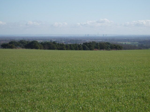 View from footpath across the site of Coles pits The view shows where the Coles pits used to be until the late sixties or early seventies, they were then levelled to amalgamate two fields into one large unit. In the distance is Didcot power station.