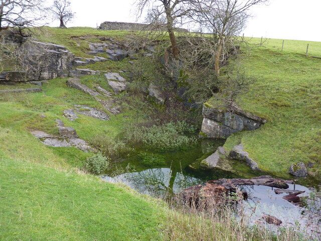 Pool and reflections A small spring nearby feeds this small pool in what may have been a quarry