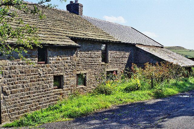Farm on Shawcliff Lane. Modernised, but still barking dogs.