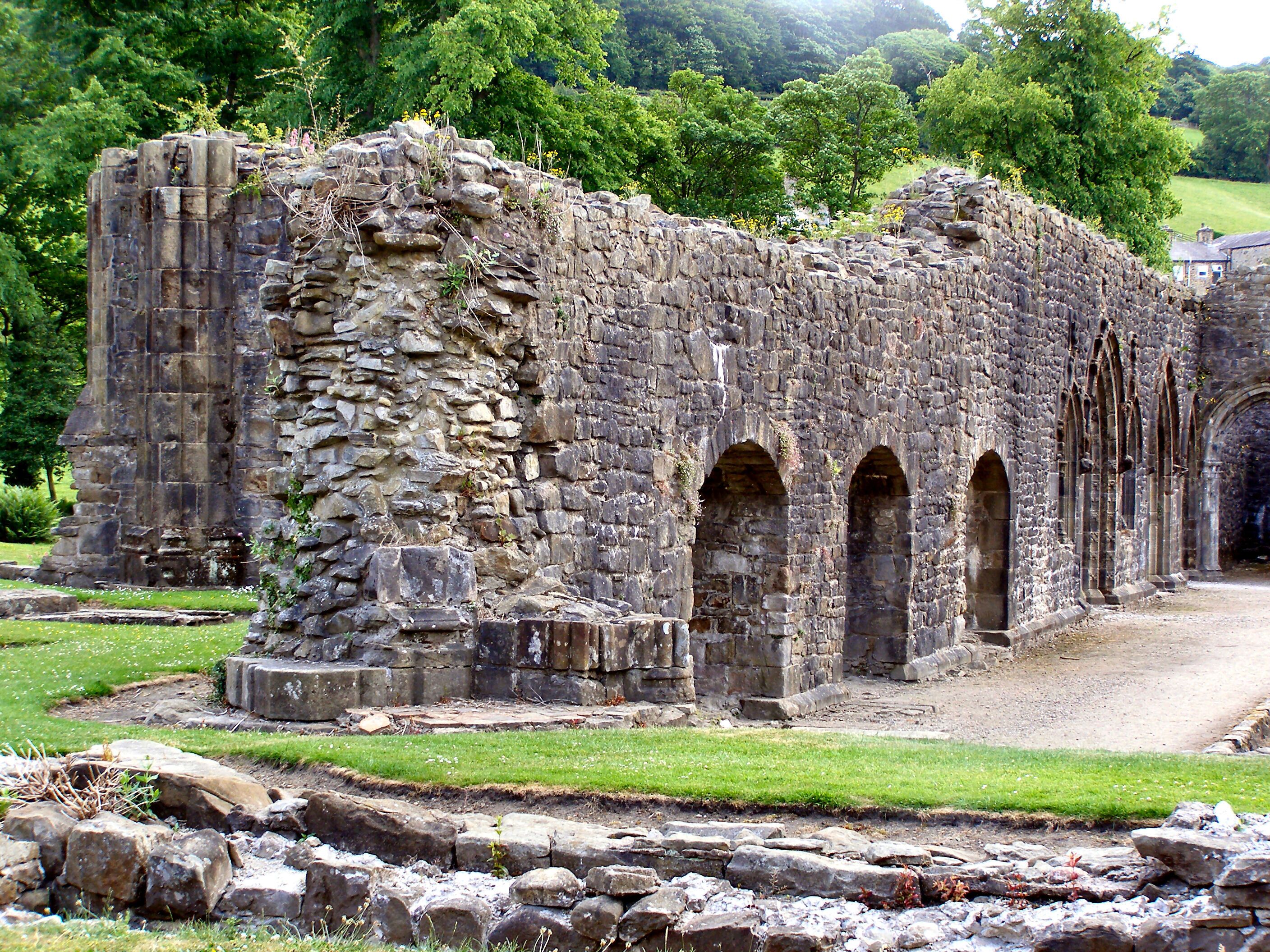 Whalley Abbey, near to Billington, Lancashire, Great Britain. The ruins of Whalley Abbey are a Grade I listed building and a Scheduled Ancient Monument. The site of the abbey was first consecrated in 1306 after the Cistercian monks from Stanlow Abbey had moved to Whalley. The church was completed in 1380 but the remainder of the abbey was not finished until the 1440s. The abbey closed in 1537 as part of Henry VIII�s dissolution of the monasteries. Following which, the abbey was largely demolished and a country house was built on the site. In the 20th century the house was modified and it is now the Retreat and Conference House of the Diocese of Blackburn. Today, only the foundations remain of the church. The remains of the former monastic buildings are more extensive. <a title="http://www.whalleyabbey.co.uk/" rel="nofollow" href="http://www.whalleyabbey.co.uk/">Link</a><img style="padding-left:2px;" alt="External link" title="External link - shift click to open in new window" src="http://s0.geograph.org.uk/img/external.png" width="10" height="10"/> Official abbey web site <a title="http://en.wikipedia.org/wiki/Whalley_Abbey" rel="nofollow" href="http://en.wikipedia.org/wiki/Whalley_Abbey">Link</a><img style="padding-left:2px;" alt="External link" title="External link - shift click to open in new window" src="http://s0.geograph.org.uk/img/external.png" width="10" height="10"/> Wikipedia article See other images of <a href="/snippet/1774" title="See other images in Whalley Abbey">Whalley Abbey</a>