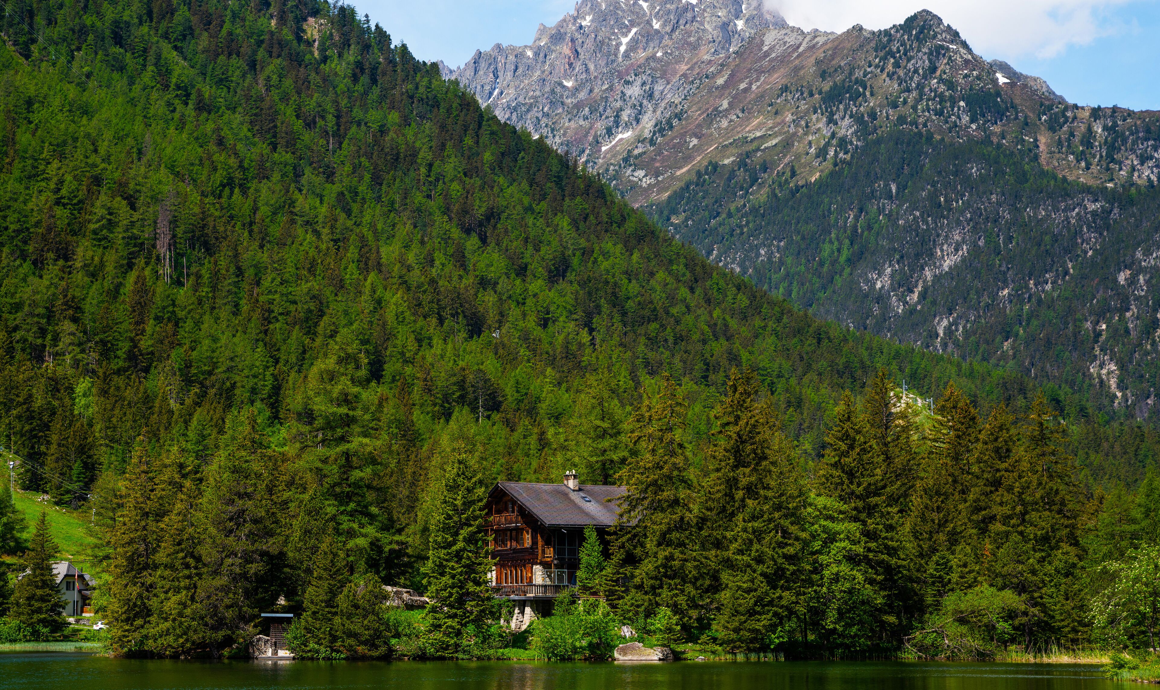 Great view of mountain ranges above lake Champex-Lac. Picturesque scene. Popular tourist attraction. Location place Swiss alps, Europe. Beauty world.