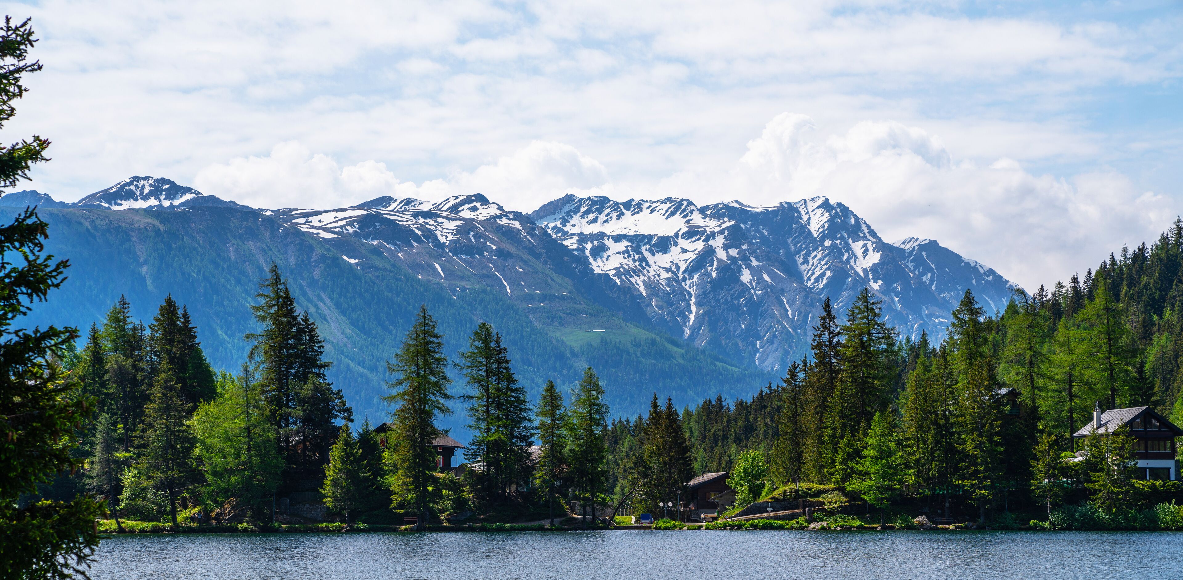 Great view of mountain ranges above lake Champex-Lac. Picturesque scene. Popular tourist attraction. Location place Swiss alps, Europe. Beauty world.