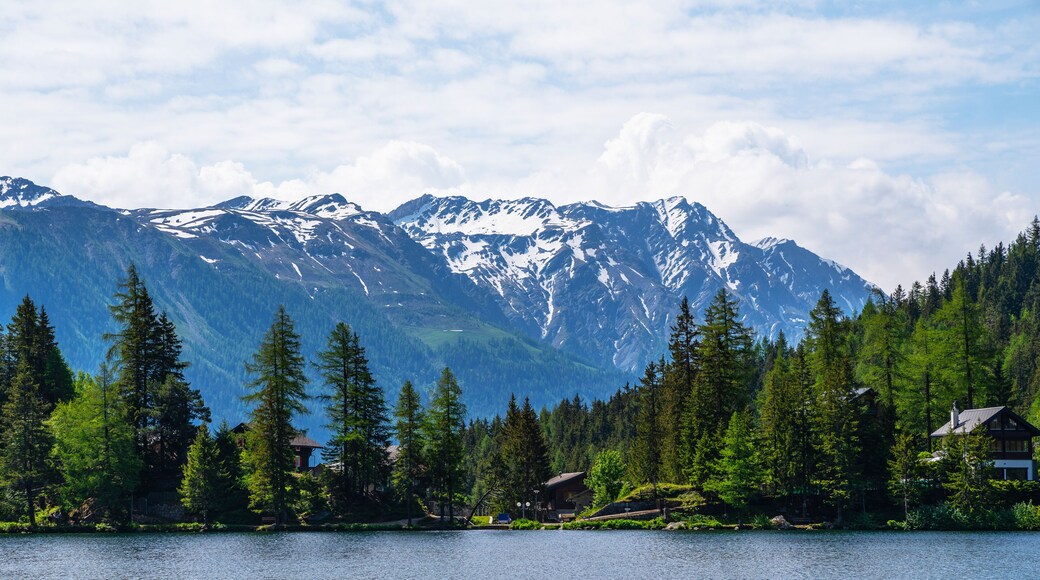 Great view of mountain ranges above lake Champex-Lac. Picturesque scene. Popular tourist attraction. Location place Swiss alps, Europe. Beauty world.