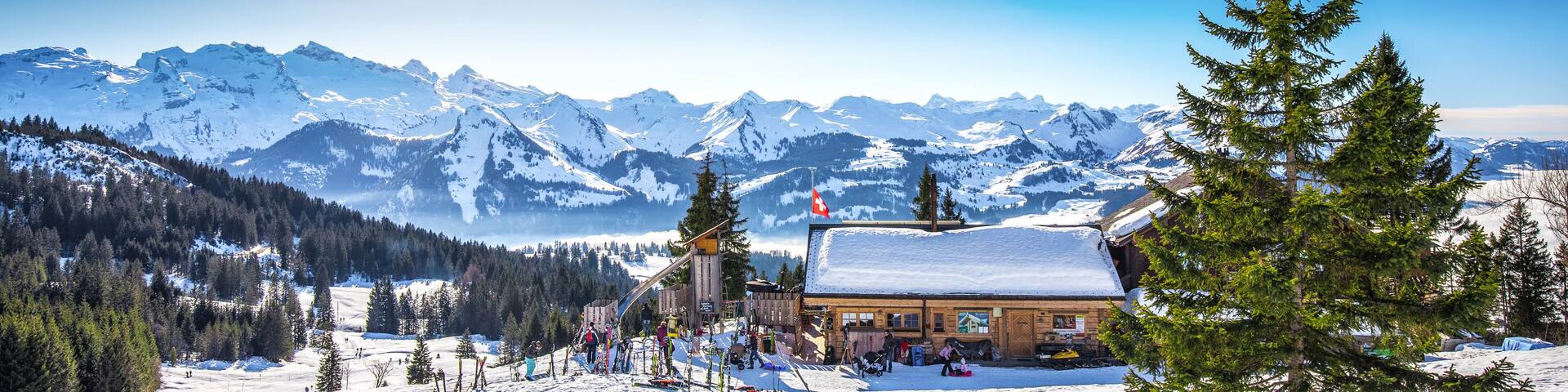 Beautiful winter landscape. Chalet covered by fresh snow in Ibergeregg, Switzerland, Europe.