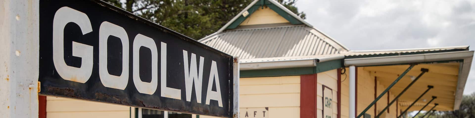 Goolwa which includes signage and a small town or village